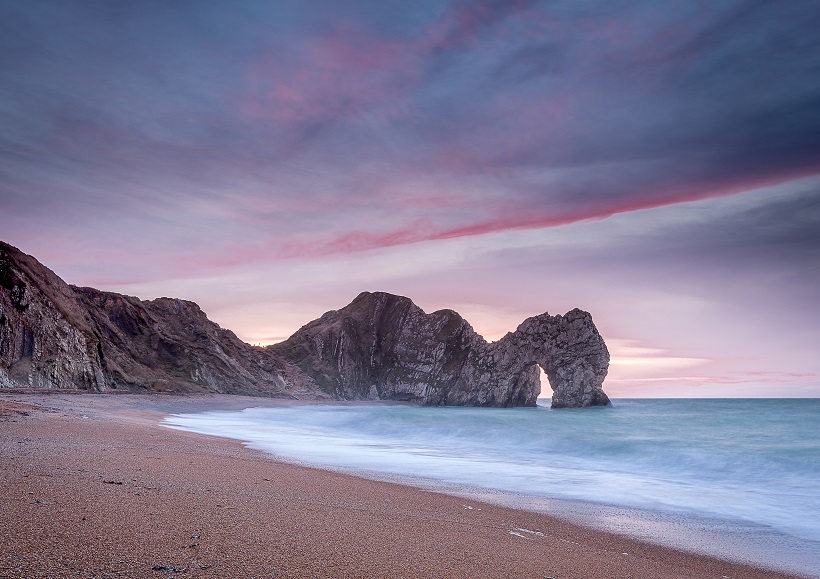 A spring dawn at Durdle Door, Dorset - photo by Robert Palmer