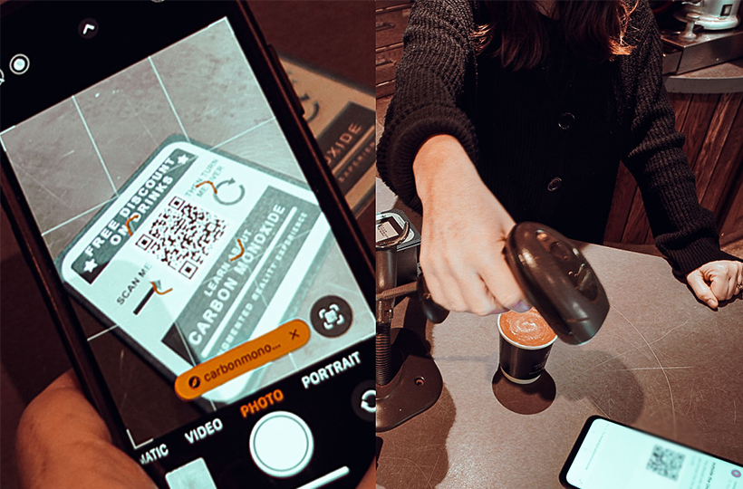 A phone camera scanning a QR code next to a barista scanning a QR code