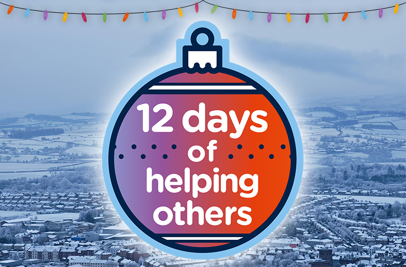 An animated bauble with '12 days of helping others' against a snowy town backdrop