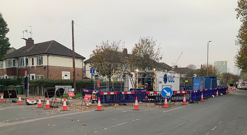 SGN works involving barriers and signs in a residential road.